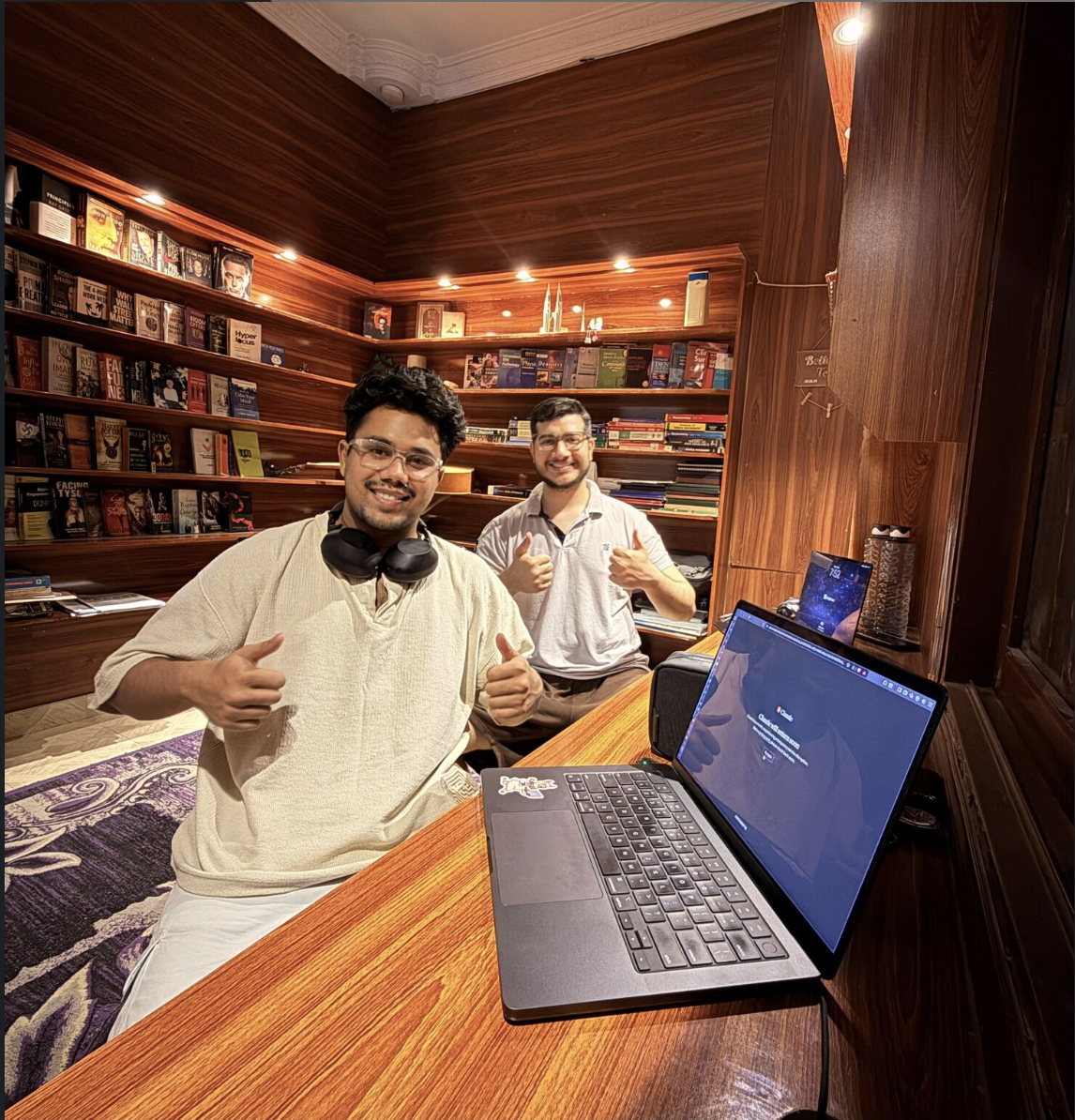 Raza Haider and co-founder Raheel building Loopless AI in a library