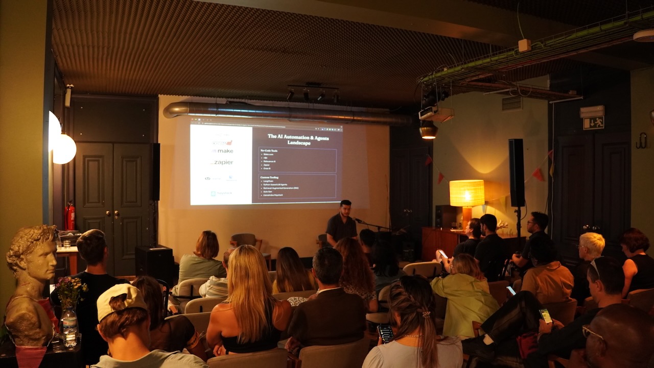Raza Haider presenting the AI automation and agents landscape to a full room in Lisbon