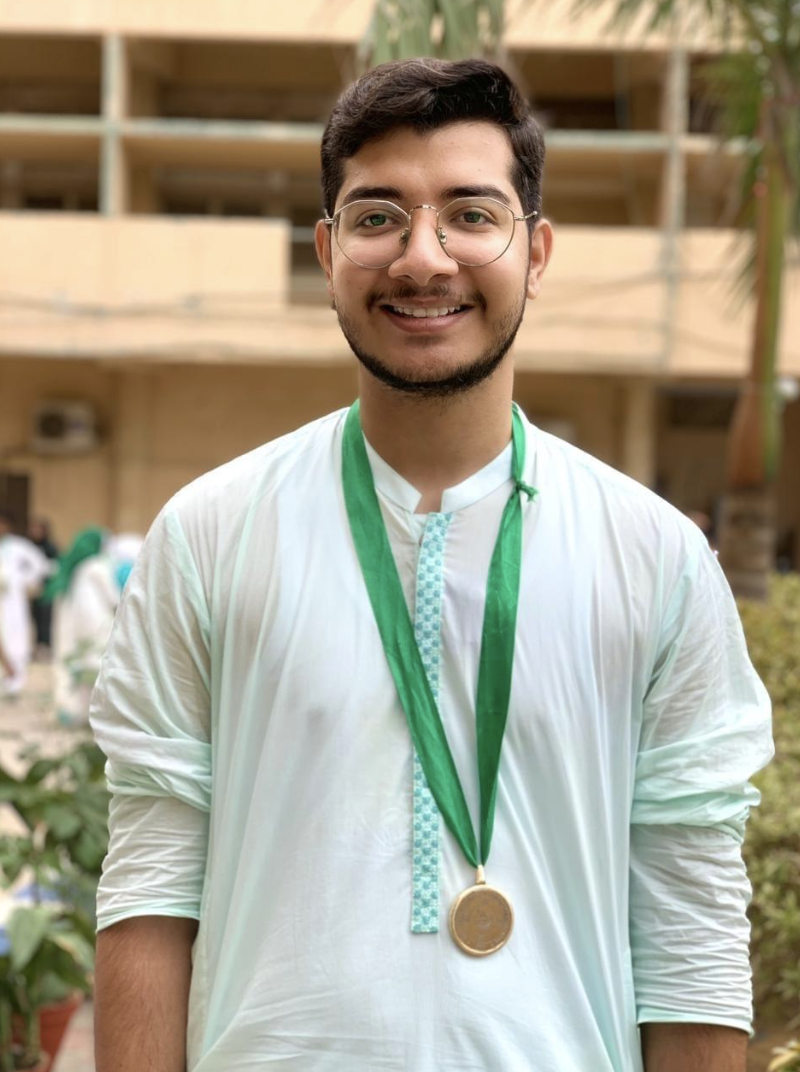 Raza Haider wearing his gold medal