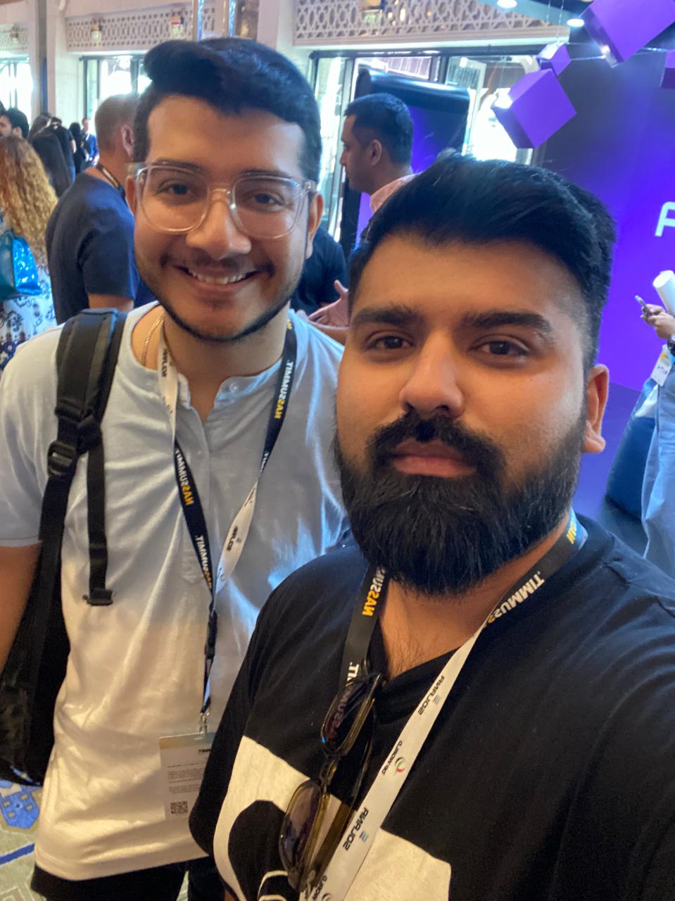 Raza Haider with a creator on the NAS Summit Dubai floor